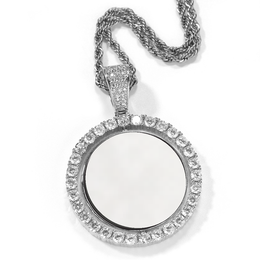 Silver-tone photo pendant with a white photo area and stone-set rim on a white background
