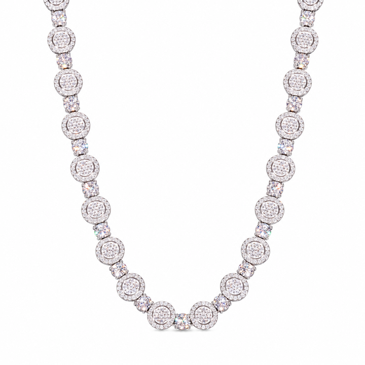 Silver-tone moissanite tennis chain with round halo clusters in a U-shaped drape on white