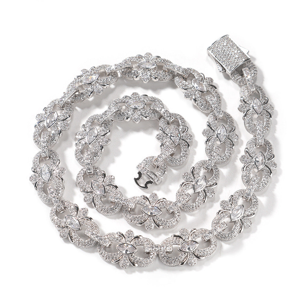 Silver-tone marquise floral link necklace coiled with clear cubic zirconia and its box clasp open