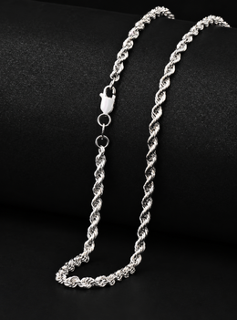 Silver-tone rope chain showing its lobster clasp and connecting rings on black fabric