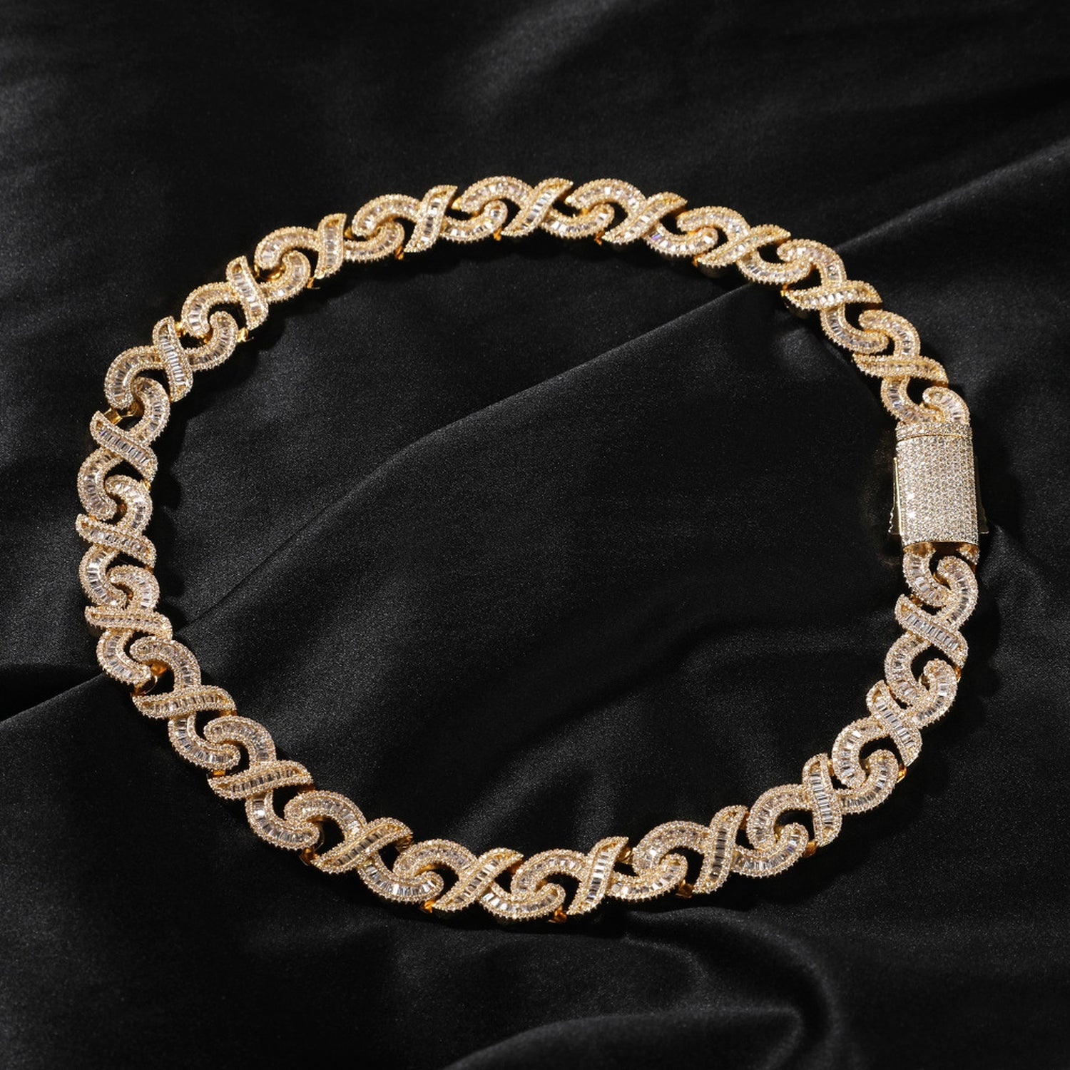 Gold 15mm infinity link necklace on black fabric