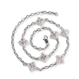 Pink four-leaf clover adjustable necklace in a silver-tone setting on white