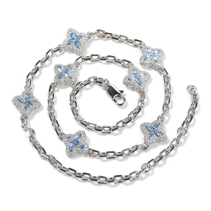 Aqua Blue four-leaf clover adjustable necklace in a silver-tone setting on white