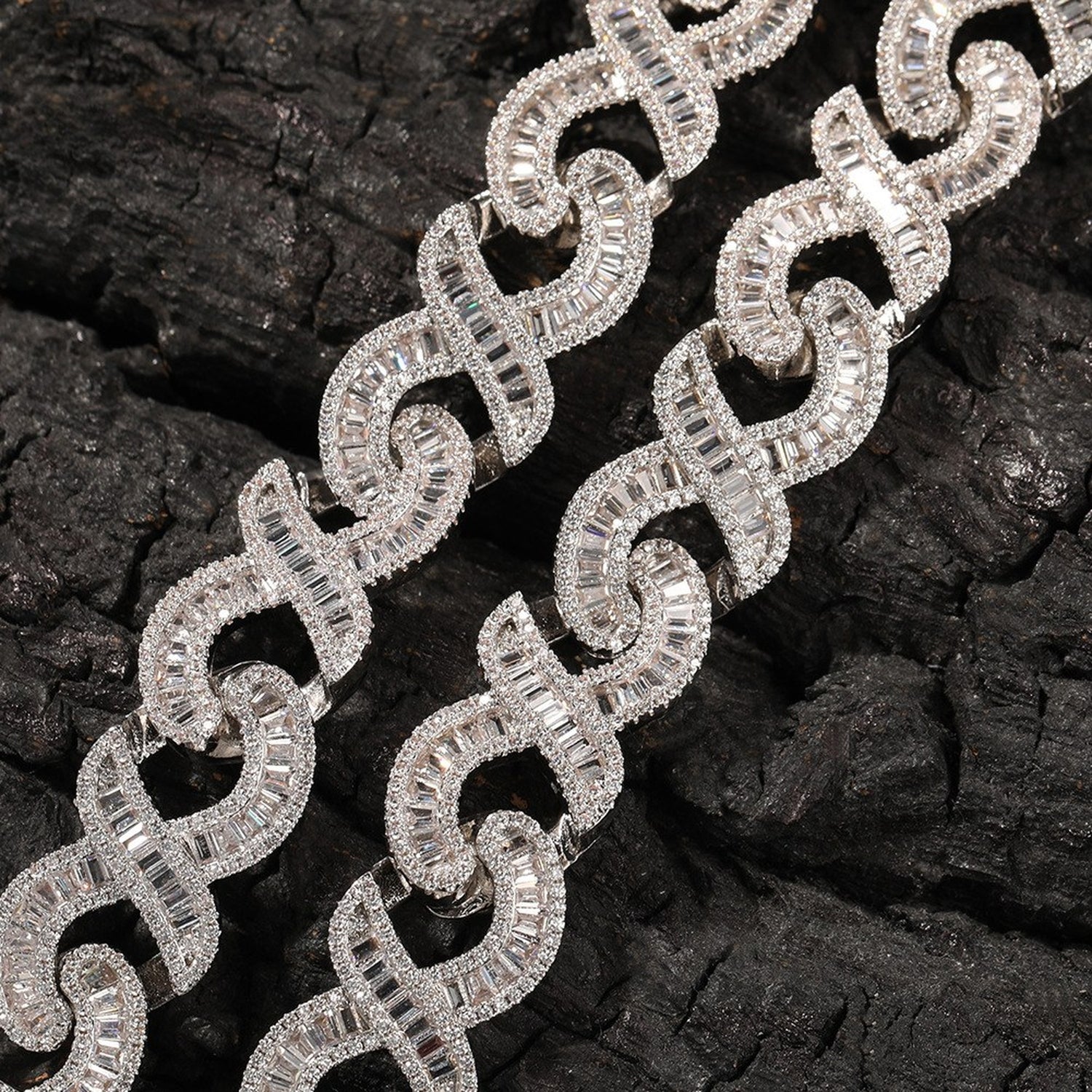 Baguette-cut cubic zirconia and infinity necklace link detail