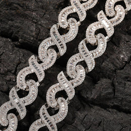 Baguette-cut cubic zirconia and infinity necklace link detail