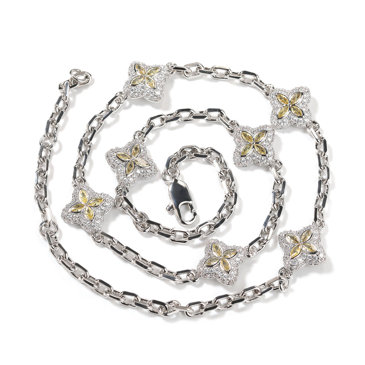Yellow four-leaf clover adjustable necklace in a silver-tone setting on white