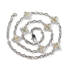 Yellow four-leaf clover adjustable necklace in a silver-tone setting on white