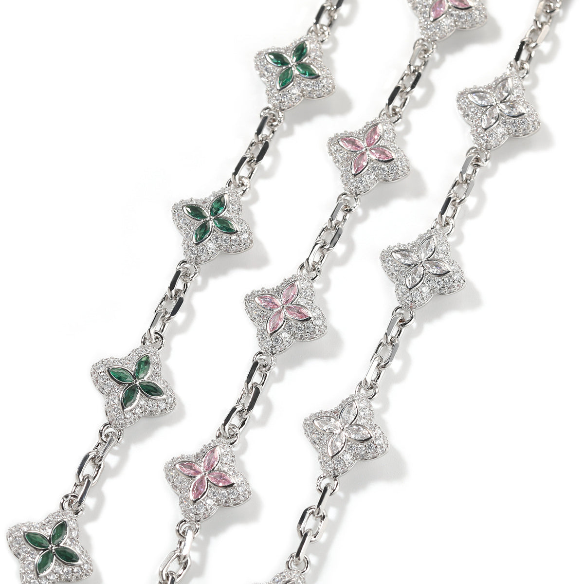 Silver-tone four-leaf clover necklace link and stone detail