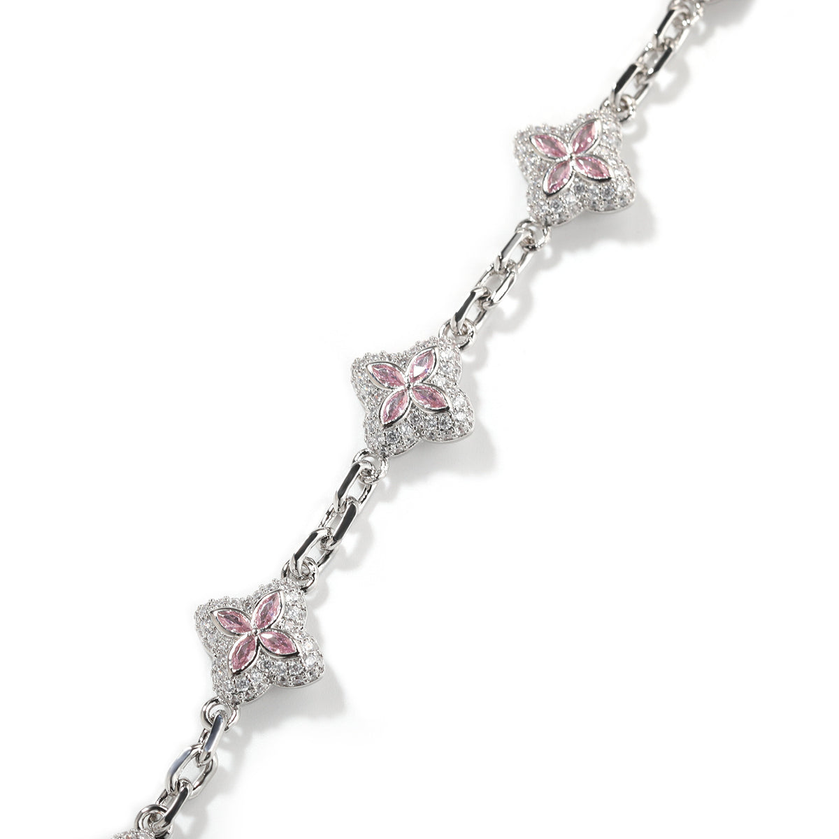 Silver-tone four-leaf clover necklace link and stone detail
