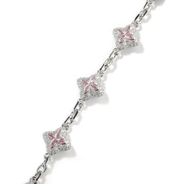 Silver-tone four-leaf clover necklace link and stone detail