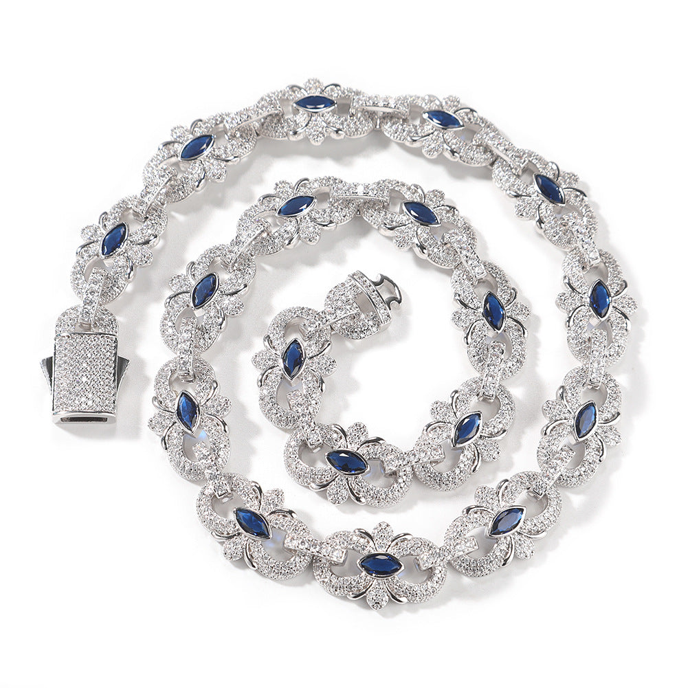 Silver-tone marquise floral link necklace coiled with blue cubic zirconia and an open box clasp