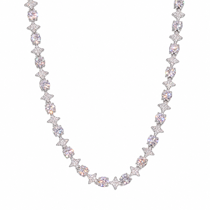 Silver-tone moissanite star tennis necklace in a U-shaped drape on white