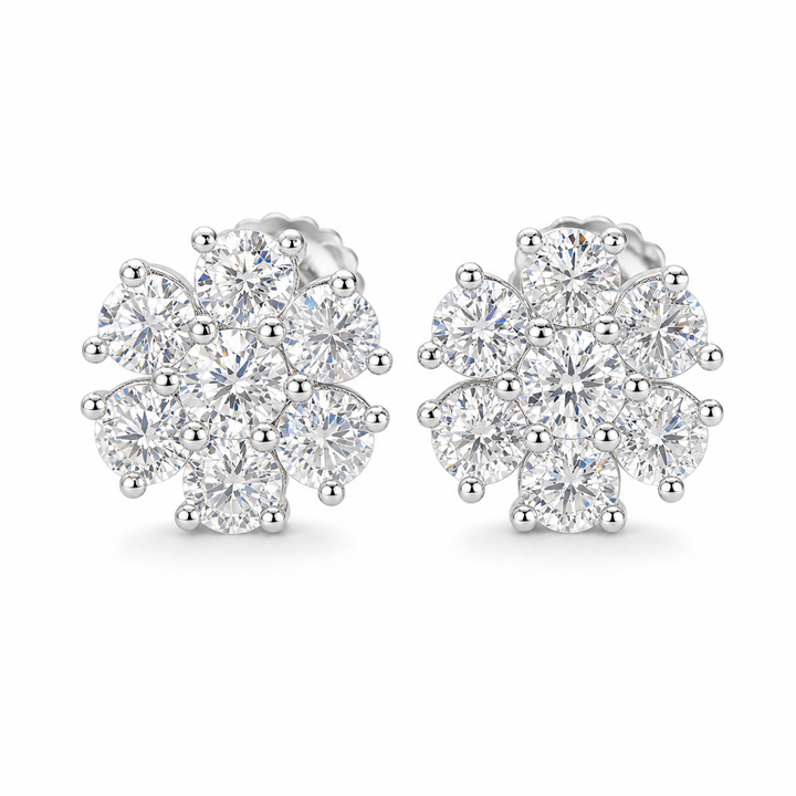 Silver-tone flower-cluster stud earrings with large clear stone petals