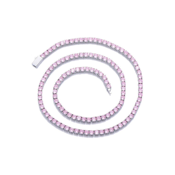 Pink-stone tennis necklace arranged in a spiral on white