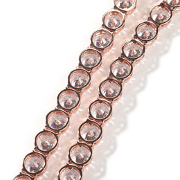 Back of the rose-gold-tone tennis chain showing open-backed round stone settings