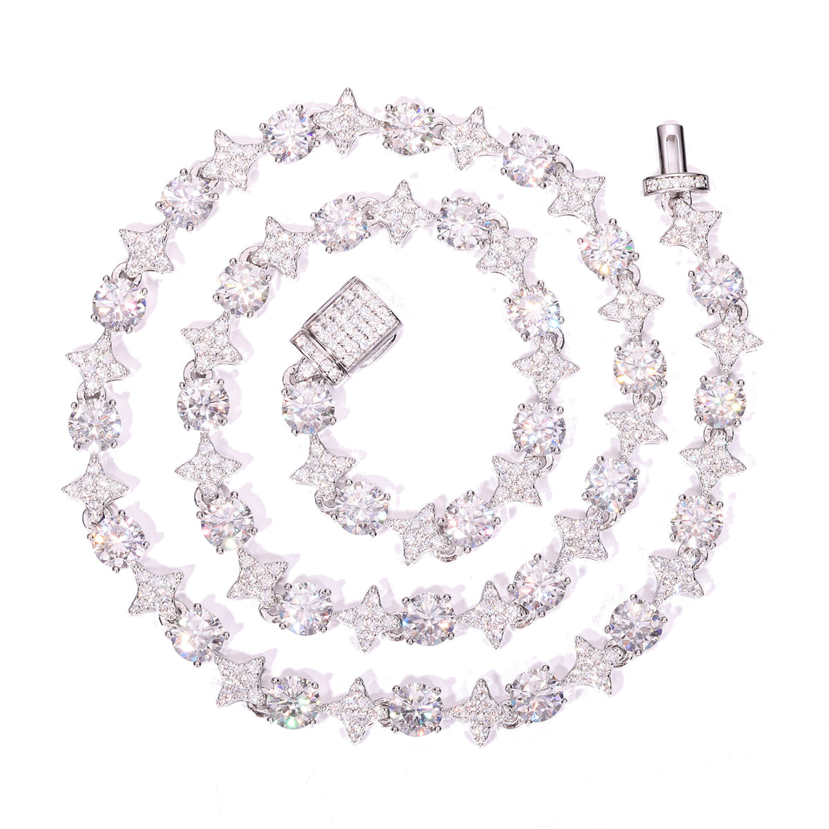 Silver-tone moissanite star tennis necklace coiled on white with an open box clasp