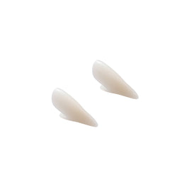 White vampire fang pair with pointed tips and curved backs