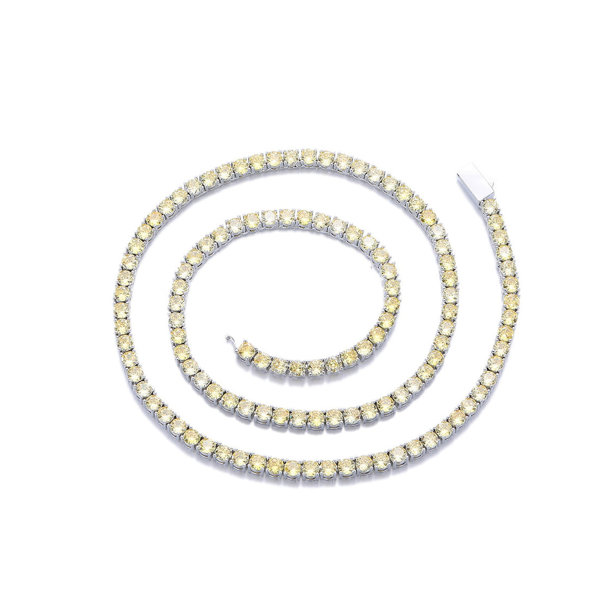 Yellow-stone tennis necklace arranged in a spiral on white